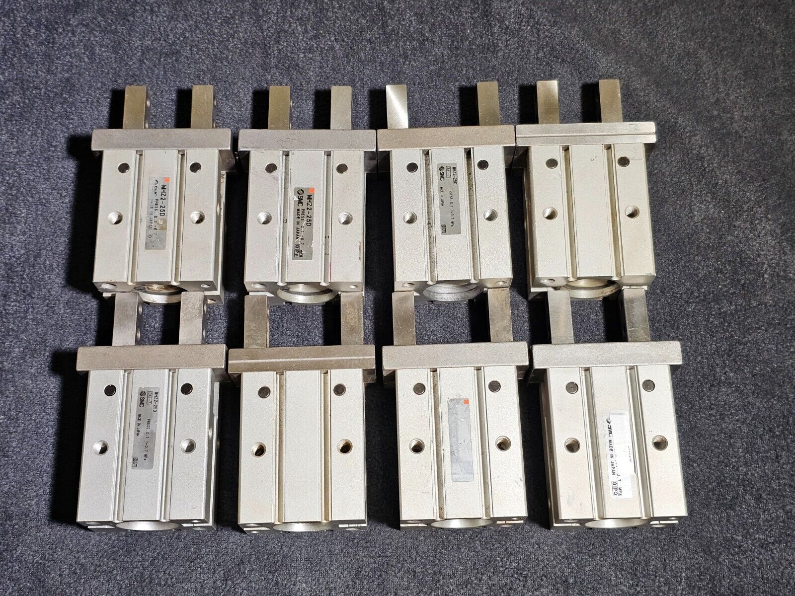 USED SMC MHZ2-25D Parallel grippers dual action ( 8 all together )