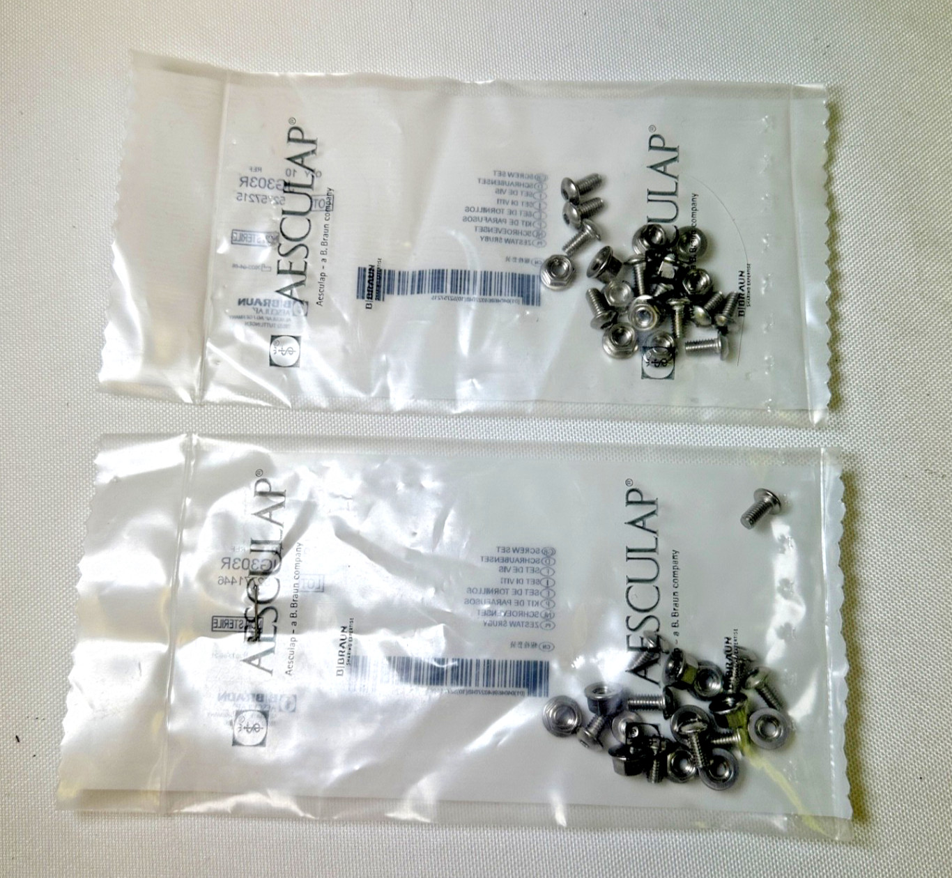 Aesculap JG303R Screw Set (x10 per pack) Set of 2 Aesculap JG303R Screw Set (x10 per pack) Set of 2