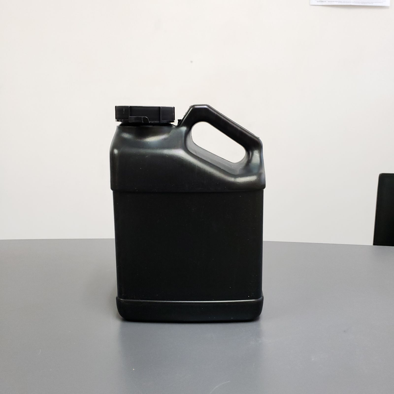 1 Gallon (128oz) F-Style Black Bottle HDPE Jug WITH LID, Fluorinated, 63mm 1 Gallon (128oz) F-Style Black Bottle HDPE Jug WITH LID, Fluorinated, 63mm