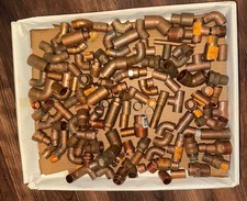 135 pc. lot 8 lbs copper 90 degree elbows, sleeves, screw fittings, plugs etc... picture
