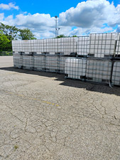 Lot of IBC Tote Liquid Storage/Shipping Containers in Metal Cages picture
