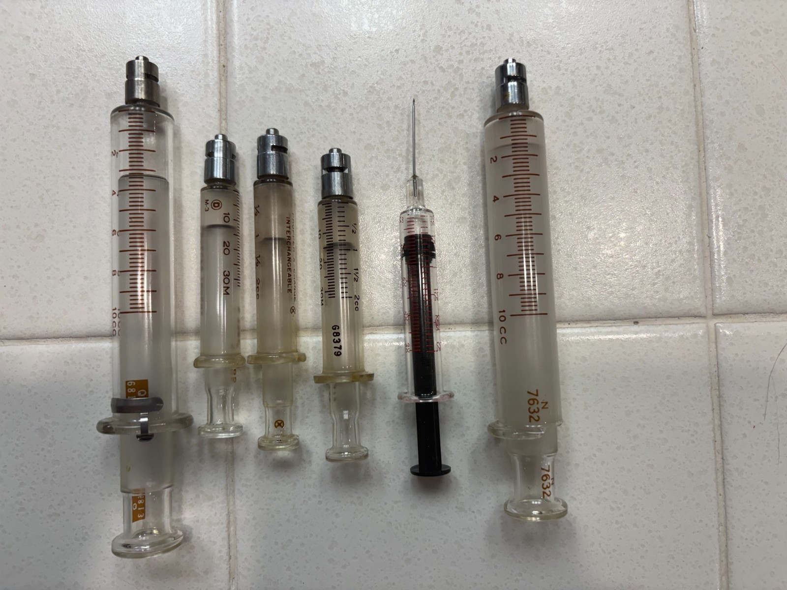 Lot of 6 Vintage Glass Medical Syringes Various Sizes Collectible Display Lot of 6 Vintage Glass Medical Syringes Various Sizes Collectible Display