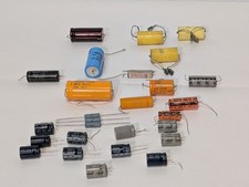 Lot of 27 Capacitors, Varying Manufacturers, Types and Sizes - As Shown picture