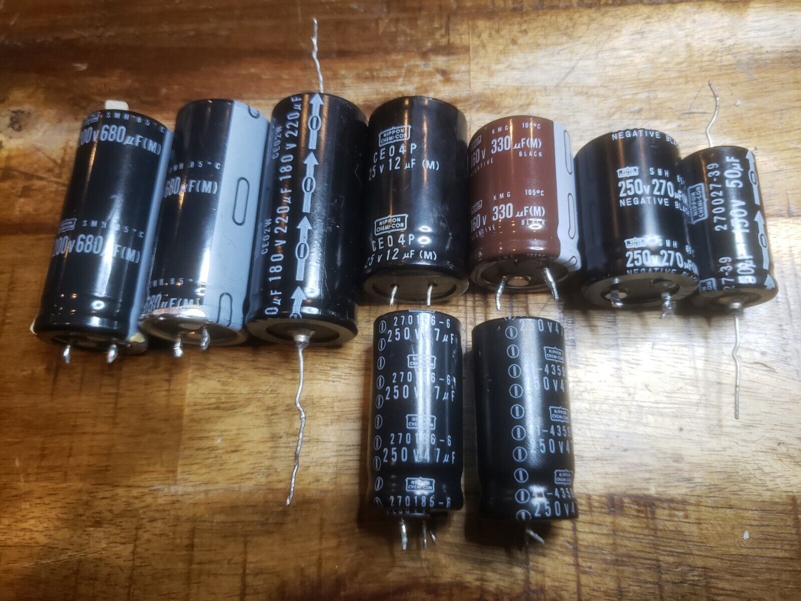 Lot of 9 Nippon Chemi-con Capacitors Various sizes
