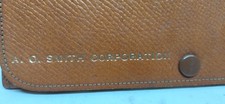 VINTAGE A. O. SMITH WELDING GLASS 'LENS' ? IN A BROWN LEATHER POCKET CASE picture